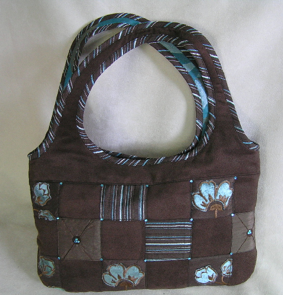 Nel Tip schoudertas - alcantare met patchwork, bruin en aqua